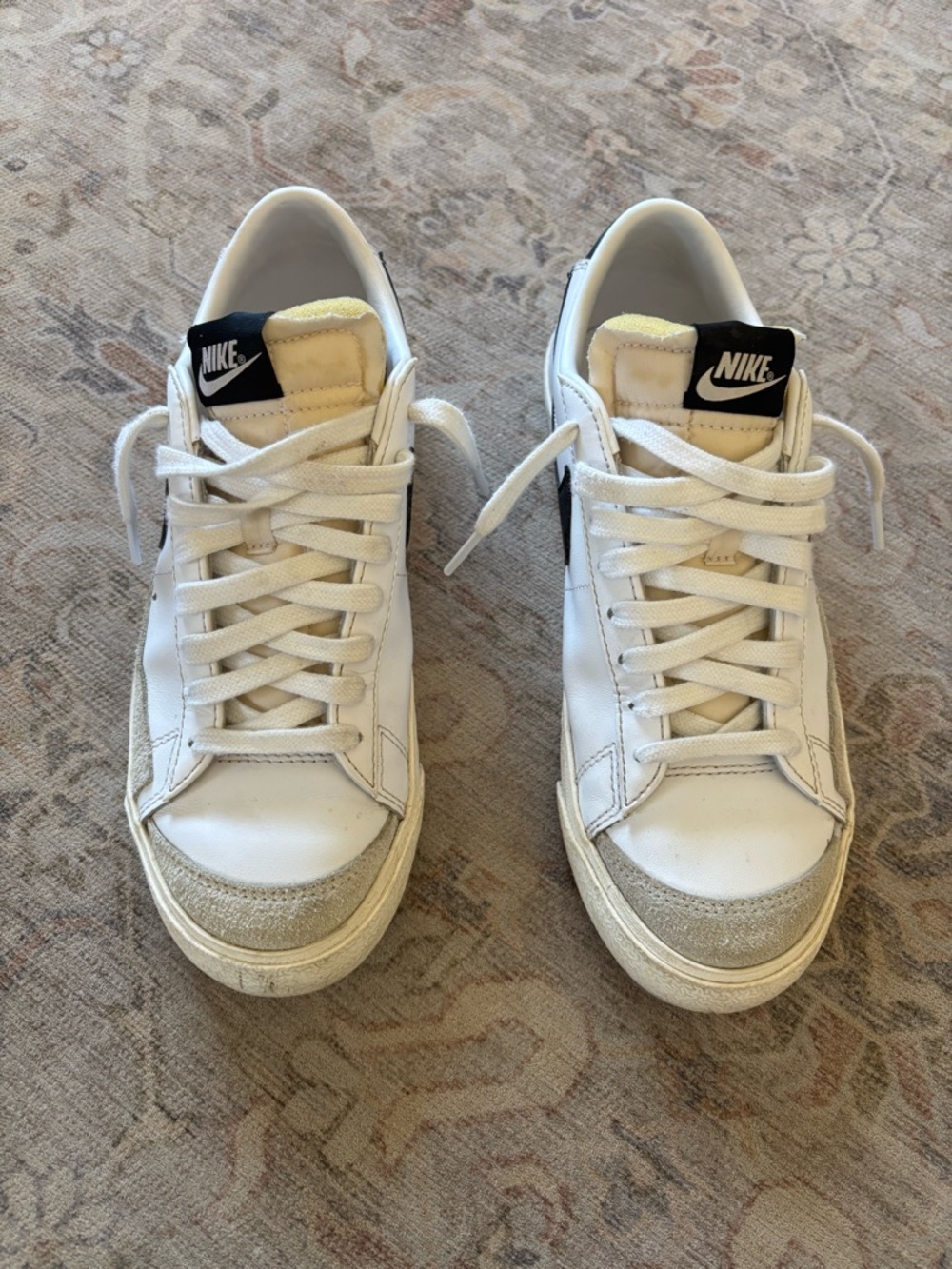 Nike White Low-Top Sneakers with Black Tongue Logo